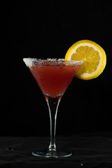 Cosmopolitan Cocktail with cranberry juice, vodka, lime juice and cointreau