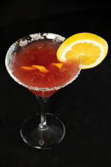 Cosmopolitan Cocktail with cranberry juice, vodka, lime juice and cointreau