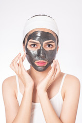 beautiful woman masking her face on white background