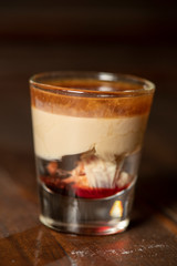 Brain Hemorrhage shot cocktail with schnapps, baileys irish cream and grenadine