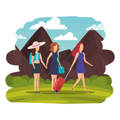 tourists girls with suitcases on the landscape