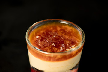 Brain Hemorrhage shot cocktail with schnapps, baileys irish cream and grenadine