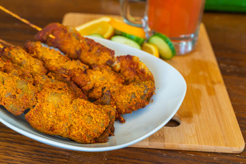 Cold Nigerian chapman cocktail served with Suya Nigerian Pepper Beef