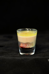 Alien Brain Hemorrhage shot cocktail with schnapps, blue curacao, baileys irish cream and grenadine