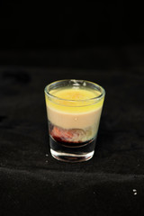 Alien Brain Hemorrhage shot cocktail with schnapps, blue curacao, baileys irish cream and grenadine