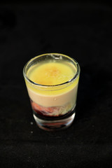 Alien Brain Hemorrhage shot cocktail with schnapps, blue curacao, baileys irish cream and grenadine
