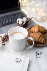 Lady bloggers white work place with business details, laptop, co