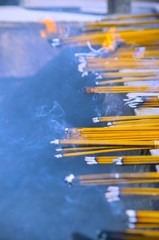 incense burning with dark background