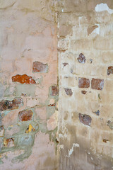 Empty Old Painted Brick Stucco Wall Texture With Damaged Plaster as Copy Space