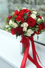 Gold rings on a wedding bouquet