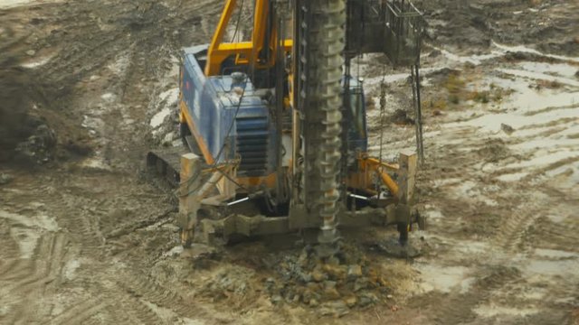 drilling rig drills soil time lapse