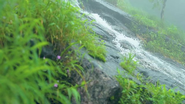Dramatic slow motion video of waterfalls in Charmadi ghat, Karnataka, India