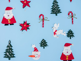 Christmas decorating with copy space on blue colour, top view.