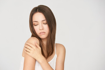 Obraz premium Young beautiful girl. Cosmetology skin care. White woman