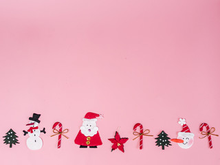 Christmas objects laid out in background.