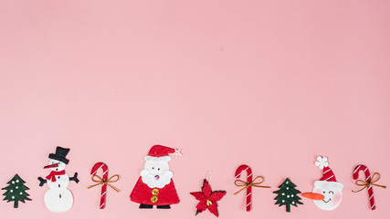 Christmas objects laid out in background.