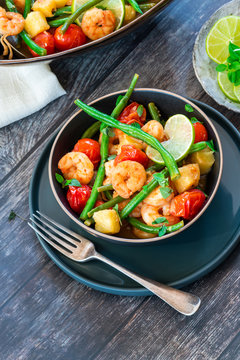 Thai prawns with pineapple and green beans - top view