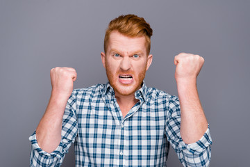 Naklejka premium Close-up portrait of nervous mad handsome attractive trendy man 
