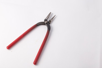 pliers red handle tool isolated on a white background