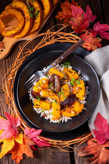 gratinated vegetarian pumpkin with barley groats, plums and thyme