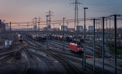 Industrial railroad infrastructure in dawn light