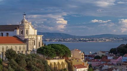 Fototapeta premium Lisbon during sunset aerial panorama view of city centre with Sophia de Mello Breyner Andresen at Autumn day to night timelapse, Portugal