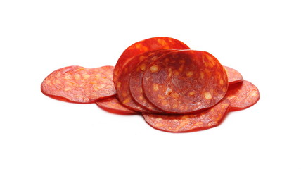 Spicy salami sausage slices isolated on white background