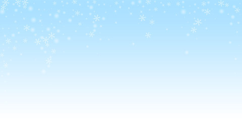 Sparse glowing snow Christmas background. Subtle f