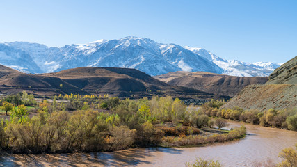 Panoramic view of a valley with snow capped mountains and River Euphrates near Erzincan, Turkey