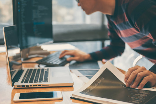 Professional Development programmer working in programming website a software and coding technology, writing codes and data code, Programming with HTML, PHP and javascript