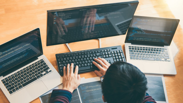 Professional Development programmer working in programming website a software and coding technology, writing codes and data code, Programming with HTML, PHP and javascript