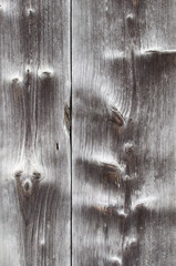 Wooden background with knots