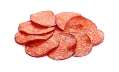 Spicy salami sausage slices isolated on white background