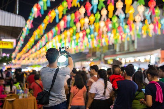 LAMPANG, THAILAND - On November 22, 2018: The photographer took a picture Show and Light colorful at Loy Krathong festival