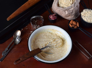 Making chickpea cookies pastries with almonds and tea rose petals. Traditional Eastern sweets. Gluten free. Grain free. Paleo diet. Healthy food. Step 1. Beat butter with sugar