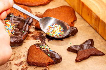 Preparing cookies with hot brown delicious molten chocolate and coarse sugar