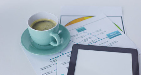 A cup of coffee on the office table