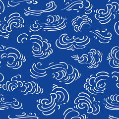 Blue japan inspired vector pattern with white clouds or waves. Surface pattern design.