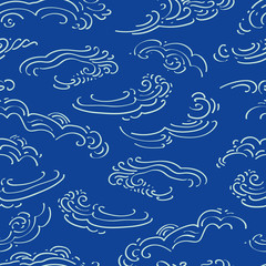 Blue japan inspired vector pattern with white clouds or waves. Surface pattern design.