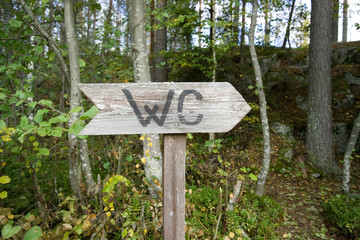 outhouse sign