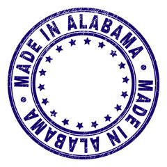MADE IN ALABAMA stamp seal watermark with grunge texture. Designed with circles and stars. Blue vector rubber print of MADE IN ALABAMA label with dirty texture.