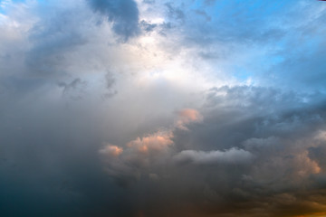 Background of dramatic sky with dark clouds. Sky before a thunder-storm.