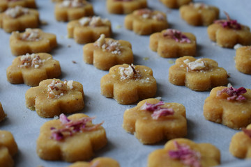 Chickpea cookies pastries with almonds and tea rose petals. Traditional Eastern sweets. Gluten...