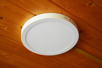 white lamp on wooden ceiling