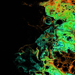 Very beautiful textural background. Paint of turquoise color flows in green and yellow-orange color on a black background. The style includes curls of marble or pulsations of agate, a flash of fire.