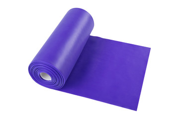 a roll of lilac ribbon for stretching, fitness or yoga, on a white background, isolate