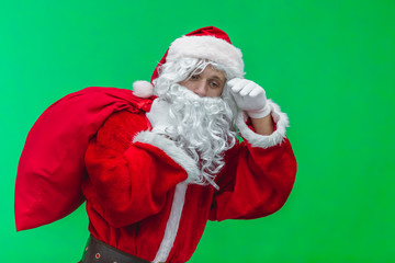 Tired Santa isolated over chromakey. close up