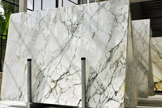 stacks of marble slabs - marble industry factory, work marble in italy, luxury interior material