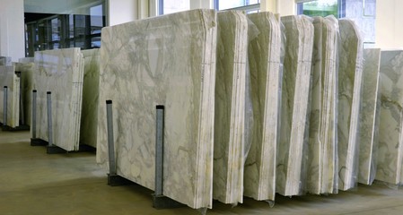 stacks of marble slab - marble industry factory, work marble in italy