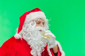 Santa Claus celebrating with champagne. chroma key